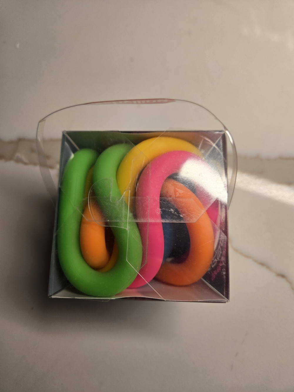 Schylling Noodlies Sensory Stretch Toy - Pink, Green, Orange - Picture 3 of 3